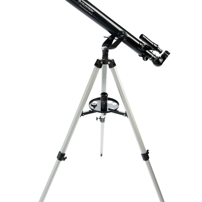 Telescopio Celestron PowerSeeker 60AZ sobre trípode de aluminio, con lente objetiva de 60 mm, buscador lateral y accesorios visibles (oculares, diagonal).