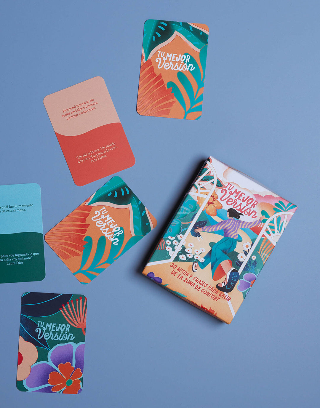 Caja de kit Amuratta con 30 tarjetas ilustradas de retos y frases inspiradoras.
