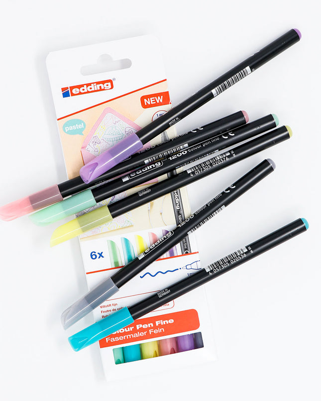 Set de 6 micropuntas Edding en colores pastel con punta fina de 0,5 mm, ideales para escritura y apuntes creativos.