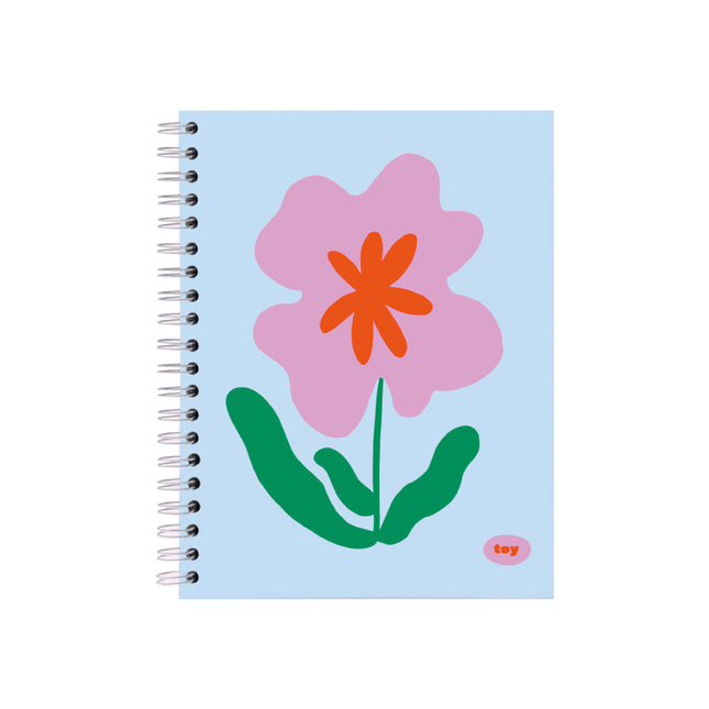 Cuaderno argollado grande Floral Azul Claro Toy (modelos 123206125 y 123206120), tamaño 21,5×28 cm, 80 hojas rayadas o cuadriculadas, argollado metálico, bolsillo interior y stickers decorativos sobre fondo blanco.