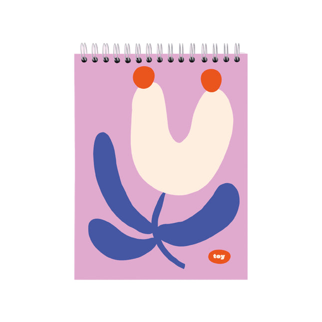 Sketchbook Floral Rosa Toy modelo 123207164 tamaño carta (~21,5×28 cm) con portada rosa estampado floral, 50 hojas blancas sin líneas, argollado.