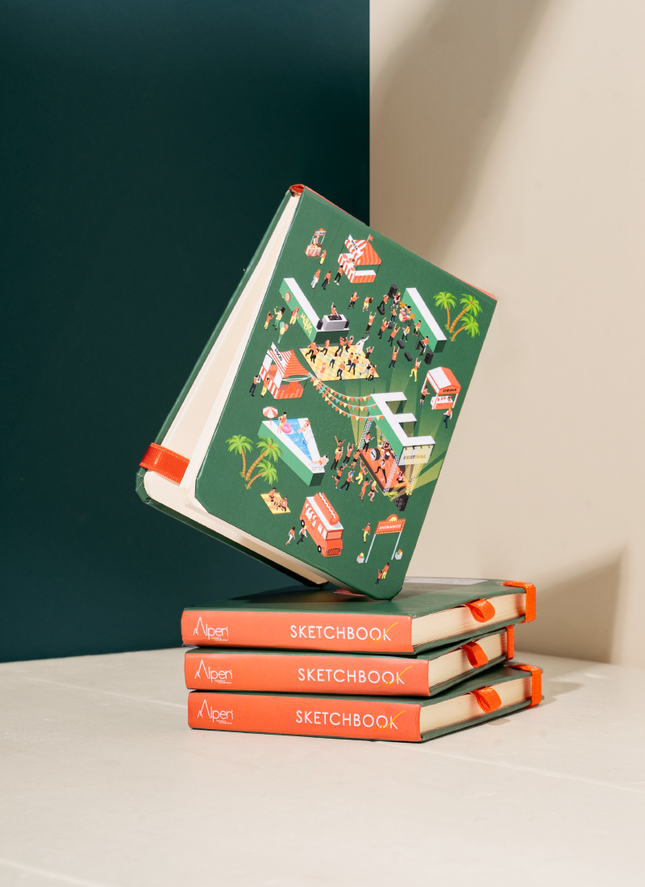 varios Sketchbook Alpen de bolsillo 13×9 cm con tapa dura ilustrada con escena musical festiva, banda elástica roja y 84 hojas blancas.
