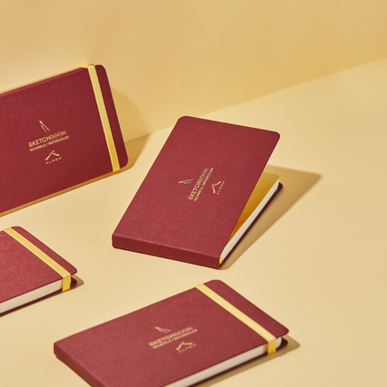 Sketchbook Alpen Acuarela 22×14 cm color vinotinto, tapa dura con banda elástica roja, 24 hojas de 300 g para técnicas húmedas.