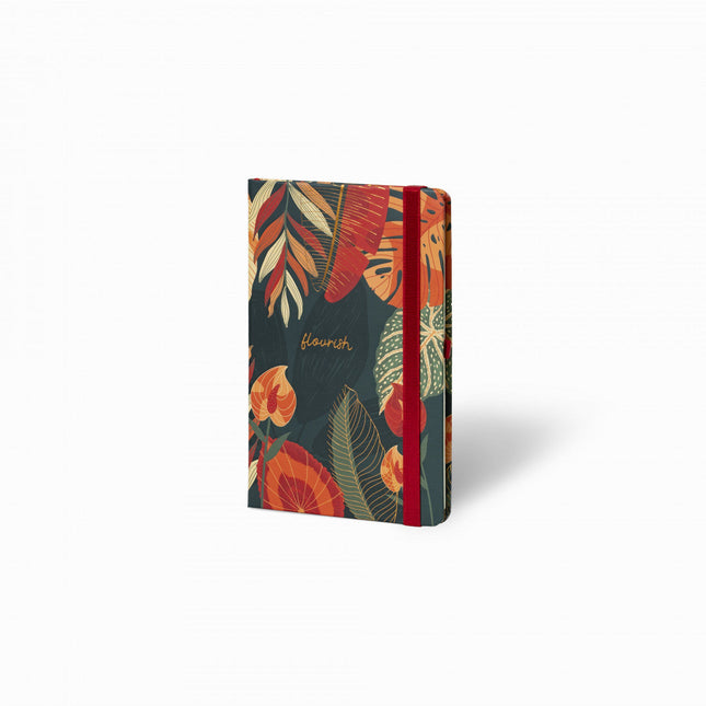 Sketchbook Alpen 12×20 cm con tapa dura de diseño floral en tonos verdes y naranjas, banda elástica roja y 84 hojas blancas.