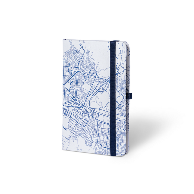 Sketchbook Alpen 12×20 cm con tapa dura ilustrada de ciudad, banda elástica azul y 84 hojas blancas.
