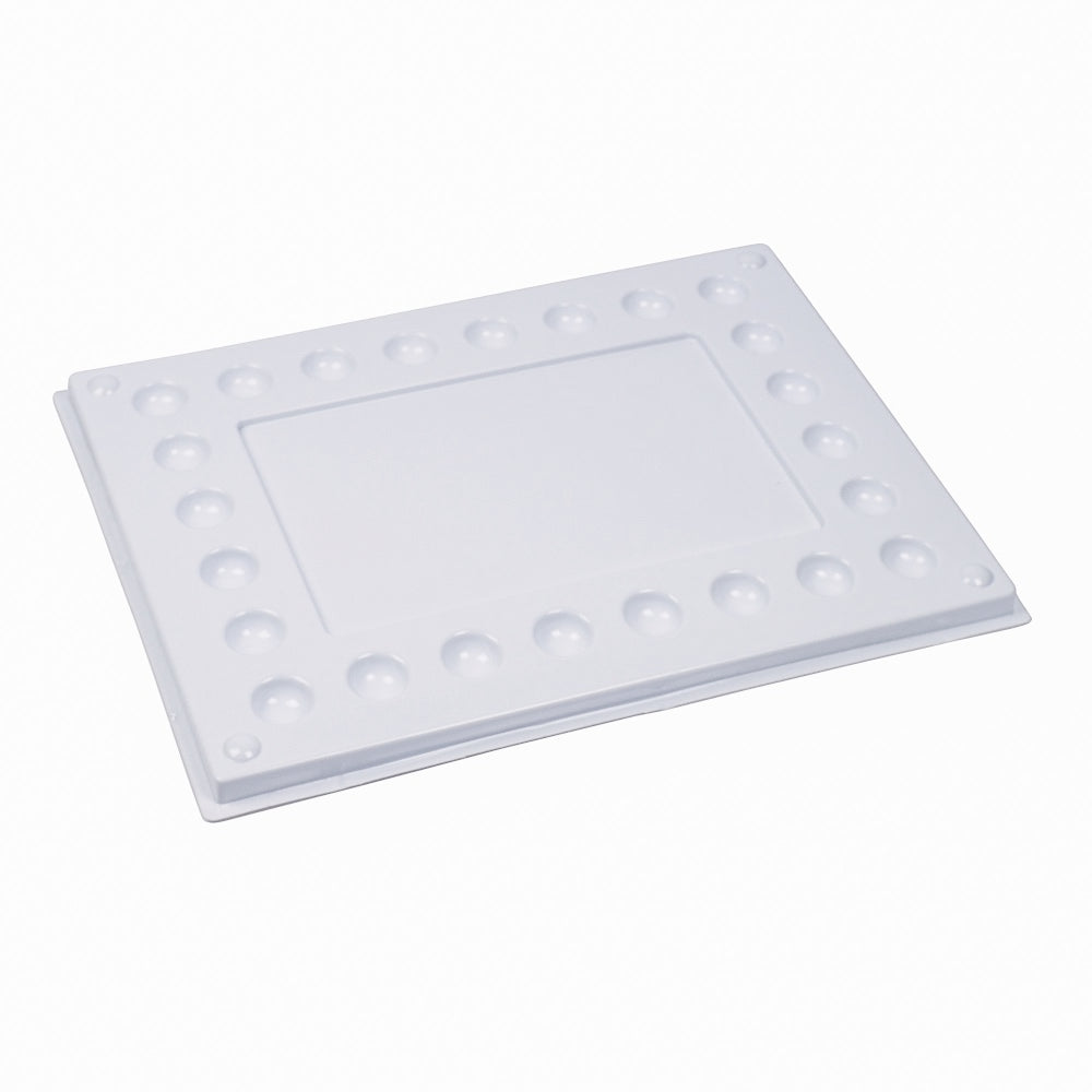 Paleta profesional #5 Giotto rectangular en plástico resistente, con 28 compartimentos circulares y área central para mezclar pinturas.