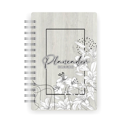 Planeador diario Dekho 2025 con pastas de madera grabada, encuadernación en argolla y diseño ecológico.